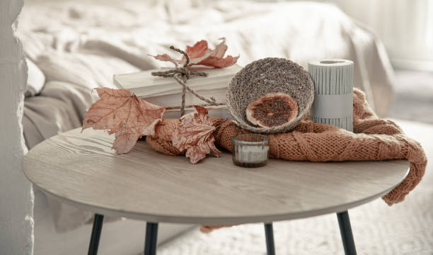 istock Autumn composition with knitted element, dry leaves and candles. 1337235836
