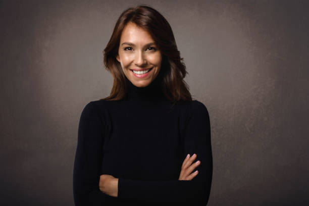 istock Attractive middle aged woman close-up studio portrait 1337237060