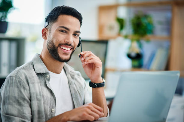 istock Shot of a young man working in a call center 1337237597