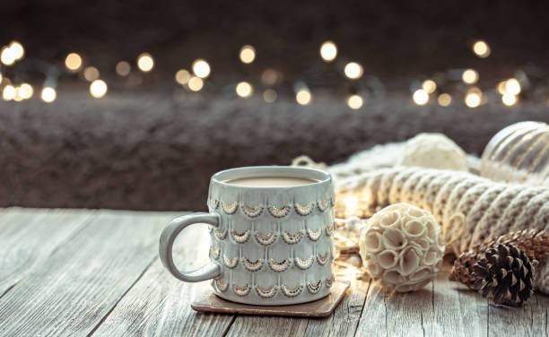 istock Home winter composition with coffee cup and decor details on blurred background. 1337239045