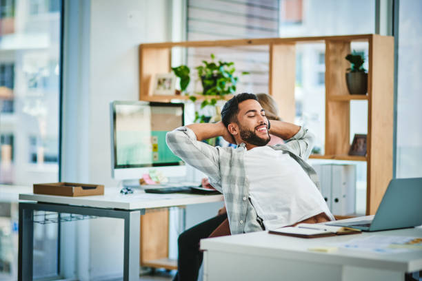 istock Shot of a young businessman taking a break from working 1337242443