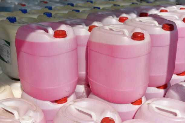 plastic jerrycans stacked plastic jerrycans with pink liquid drum container stock pictures, royalty-free photos & images