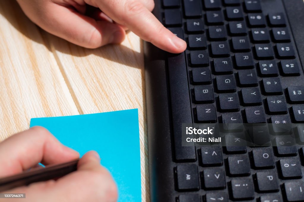 Pencil Key In Computer Hands Pressing Computer Keyboard Keys While Writing With Pencil In ...