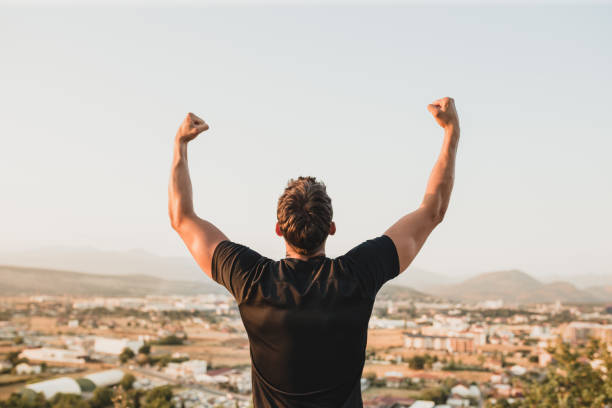 istock Man winning his life race 1337247192