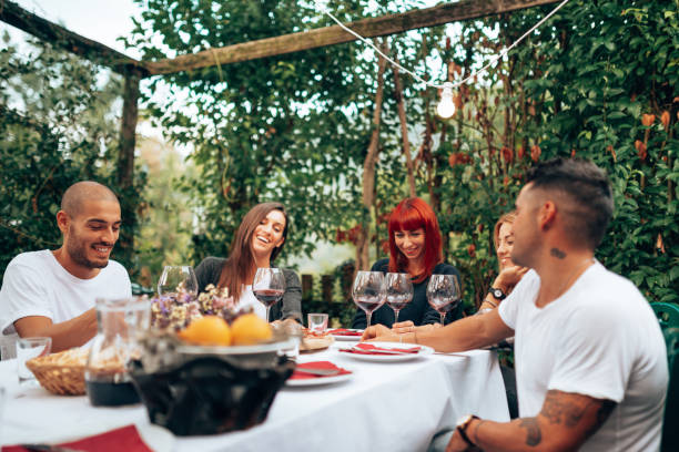 istock friends talking together at the restaurant 1337247730