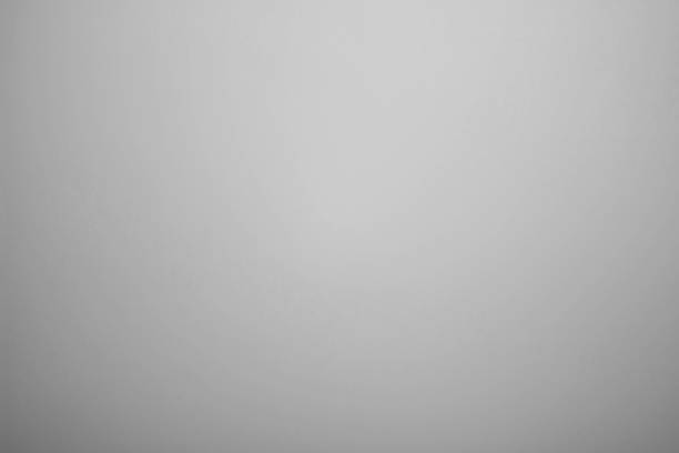 Abstract blurred frosted glass background. Grey blurry backdrop. stock photo