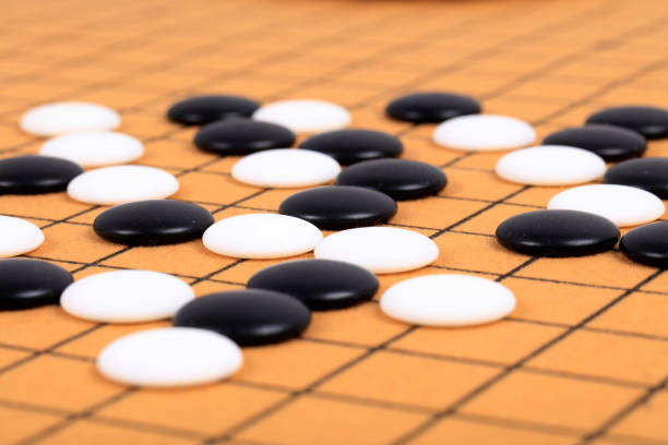 istock chinese game go,  Gobang and go game board 1337253957