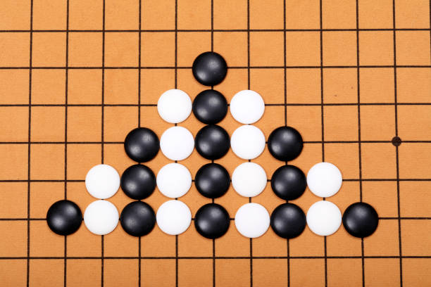 istock chinese game go,  Gobang and go game board 1337253964