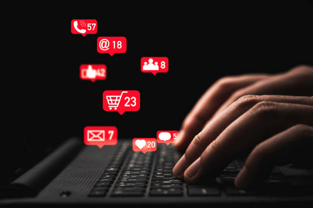 istock Man hand using laptop computer with Social media and business icons for technology and marketing concept. 1337254141