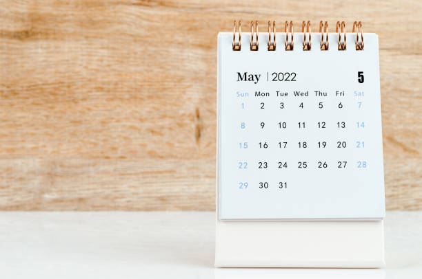 istock May desk Calendar 2022 on wooden table 1337254400