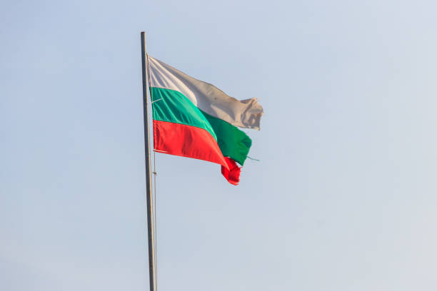 istock Waving flag of Bulgaria against blue sky 1337254449