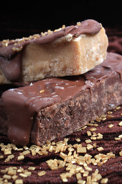 istock Chocolate, and maple, or caramel fudge on brown background 133725521
