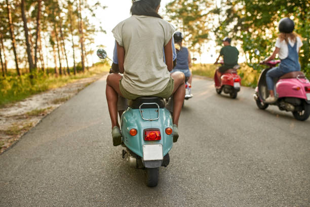 istock Selective focus on young multiracial people riding scooters 1337257010