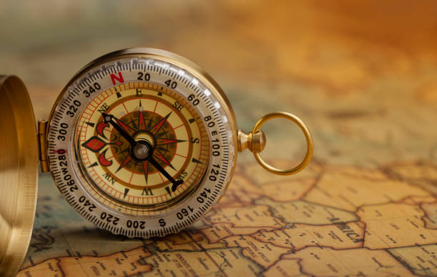 istock Classic compass on vintage map , Can be used as a background 1337257128