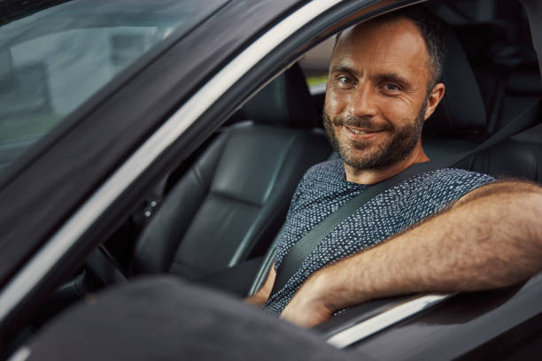 istock Confident smiling driver following safety rules and measurements 1337264646