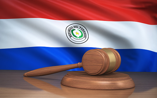 3d Render Judge Gavel and Paraguay flag on background (close-up)