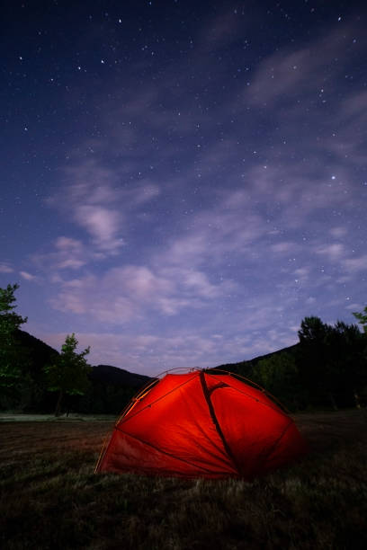 istock camping tent with stars at night 1337266247
