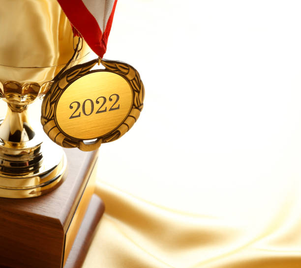 istock Trophy And Gold Medal Engraved With Year 2022 1337266380