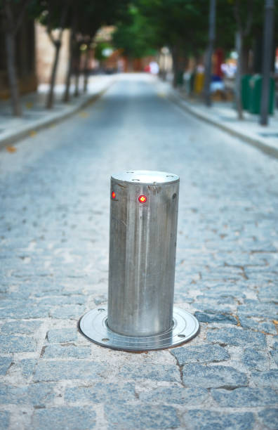istock elevating bollard with illuminated sign closing a road 1337266663