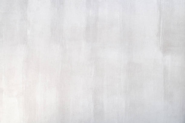 istock Wall grunge white concrete background. Dirty white wall concrete texture and splash or abstract background.Soft focus image. 1337267954