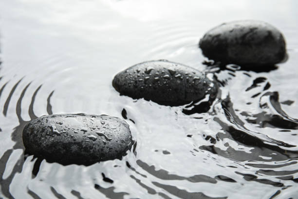 istock Spa stones in water, closeup. Zen lifestyle 1337274609