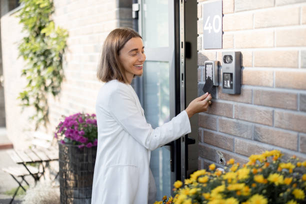 istock Woman gets access to enter home by card 1337276103