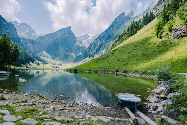 Lake Seealpsee near Appenzell in swiss Alps, Ebenalp, Switzerland Lake Seealpsee near Appenzell in swiss Alps, Ebenalp, Switzerland. Swiss mountain view appenzell stock pictures, royalty-free photos & images