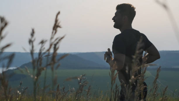 istock The handsome man jogging on the picturesque background 1337278090