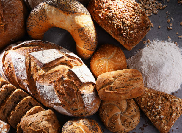 istock Assorted bakery products including loafs of bread and rolls 1337281370