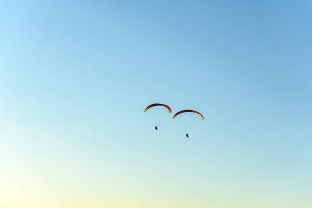 istock Paragliding flight in the air over the mountains. 1337282043
