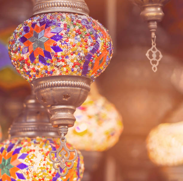 istock Middle Eastern lambas of different colors and sizes are hanging in the bazaar. 1337283420