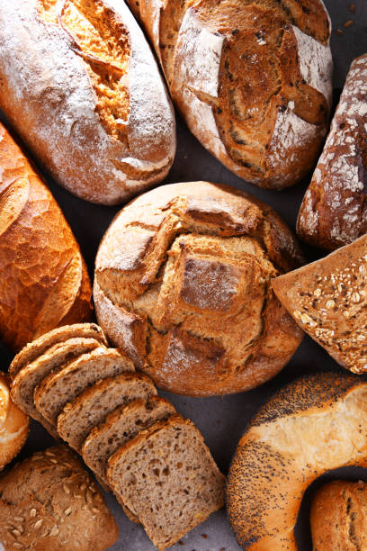 istock Assorted bakery products including loafs of bread and rolls 1337283657