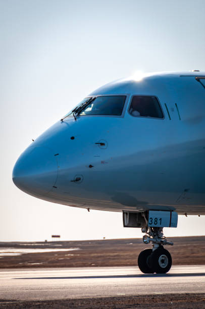 istock airplane taxing on the runway. 1337283880