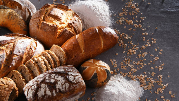 istock Assorted bakery products including loafs of bread and rolls 1337283891