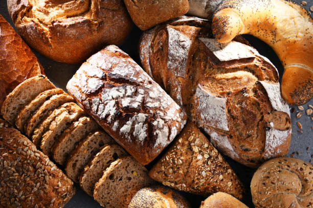 istock Assorted bakery products including loafs of bread and rolls 1337284095