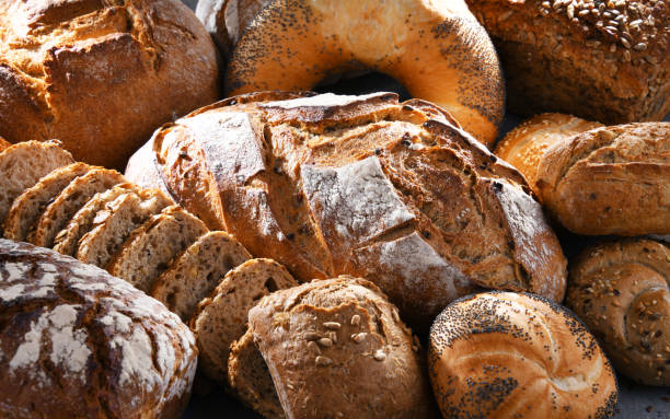 istock Assorted bakery products including loafs of bread and rolls 1337285109