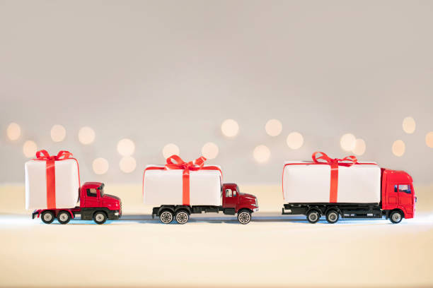 istock Trucks with gifts 1337286735