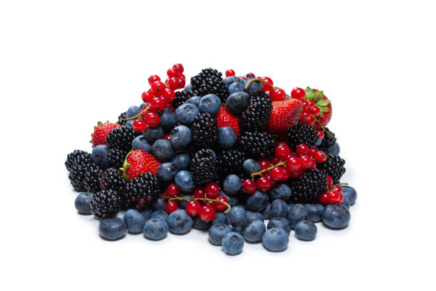 istock Blackberry, raspberry, blueberry,  red currant and mint background. 1337287816
