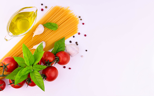 Ingredients for Italian pasta  on a white background. Copy space.