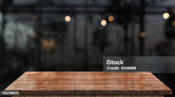 Empty Wooden Table Top With Lights Bokeh On Blur Restaurant Background Stock Photo - Download Image Now