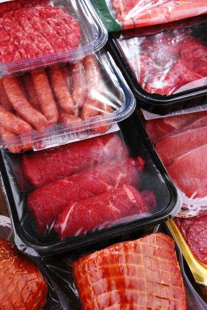 istock Composition with packages of assorted meat products 1337296048