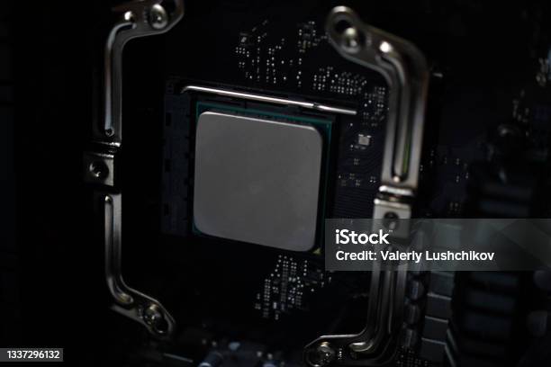 Silver Computer Components Silver Computer Processor On A Black Motherboard Stock Photo - Download ...