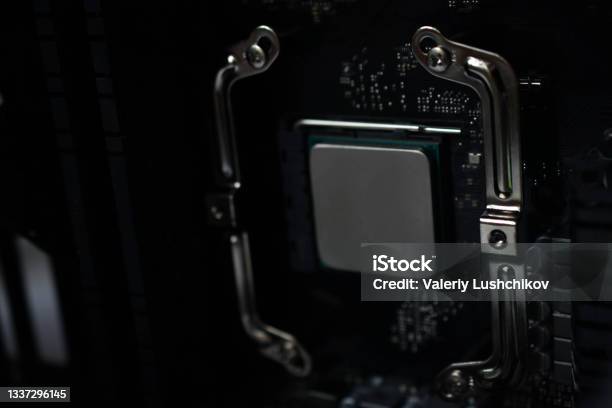 Silver Computer Components Silver Computer Processor On A Black Motherboard Stock Photo - Download ...