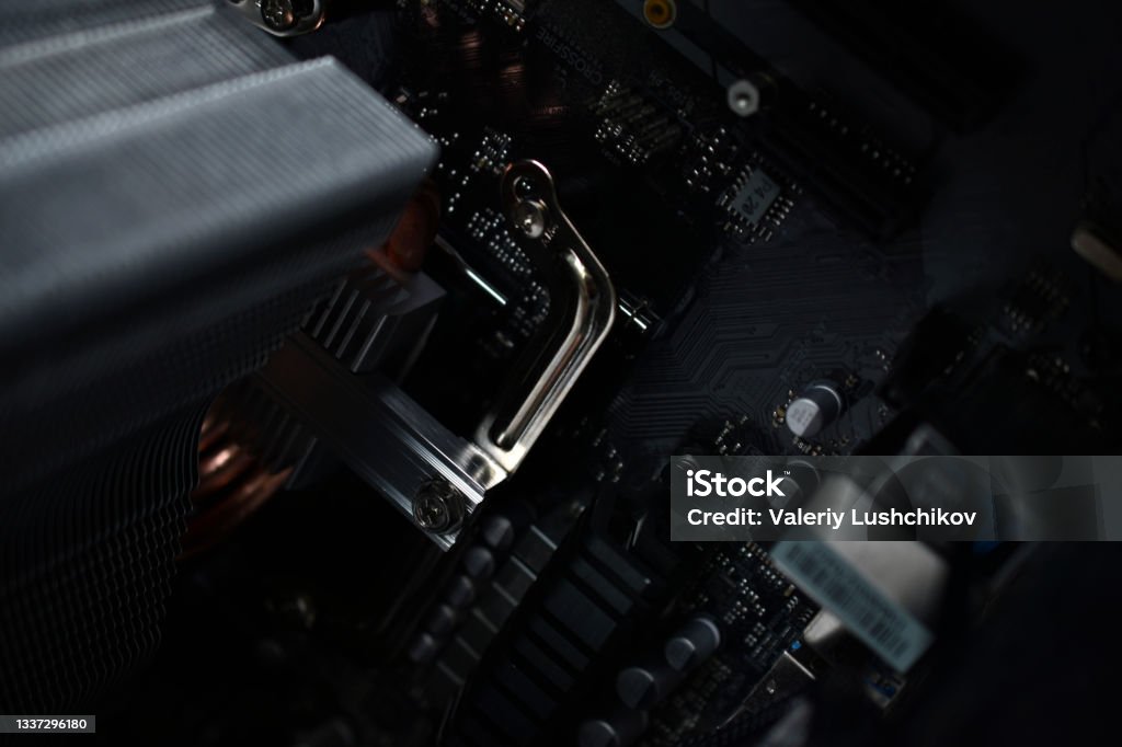 Silver Computer Components Silver Computer Processor On A Black Motherboard Stock Photo - Download ...