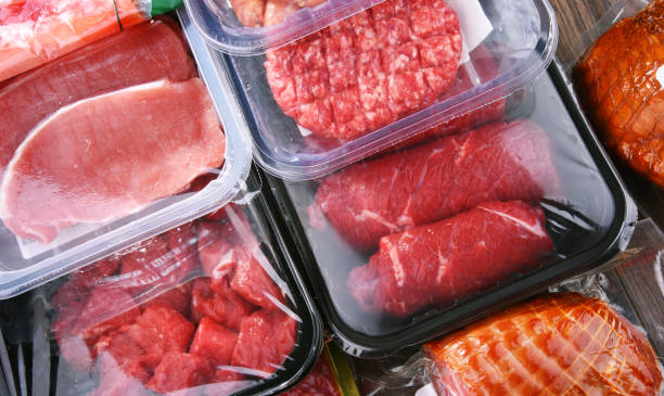 istock Composition with packages of assorted meat products 1337296386