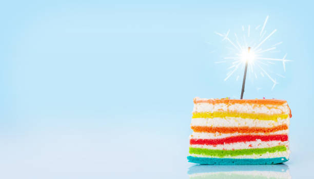 istock Birthday cake with burning sparkler 1337299591