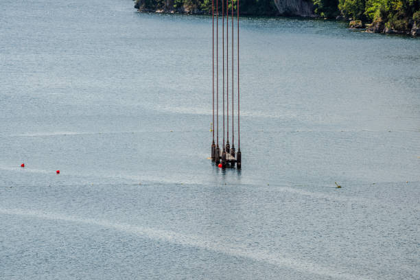 elevator used for transporting personnell and goods from sea level up to a bridge under construction.. - personnell imagens e fotografias de stock