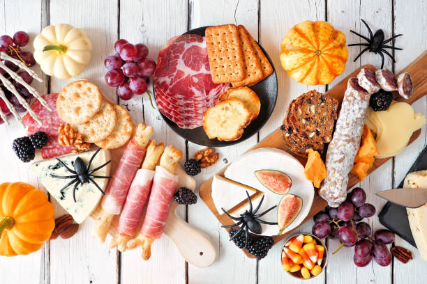 istock Halloween charcuterie table scene against a white wood background 1337306105
