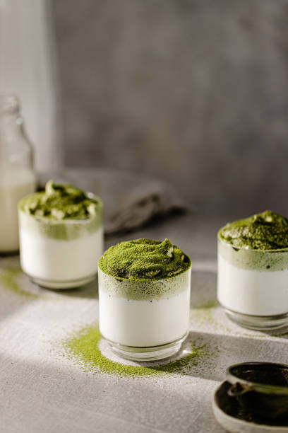 istock Freshly prepared Dalgona matcha latte glasses on the table 1337307178
