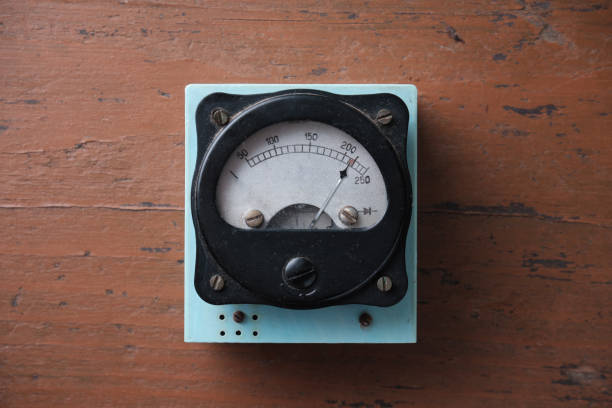istock Old analog voltmeter with a metal arrow. 1337307223
